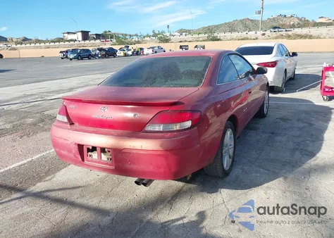 1999 Toyota Camry Solara Se V6 z USA, uszkodzony, nr VIN 2T1CF22PXXC094311